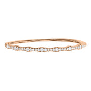 This 18K rose gold bracelet design is bound to leave everyone you encounter speechless with desire. The shape of chic. A textured finish gives diamond bangle a fresh, modern dimension.