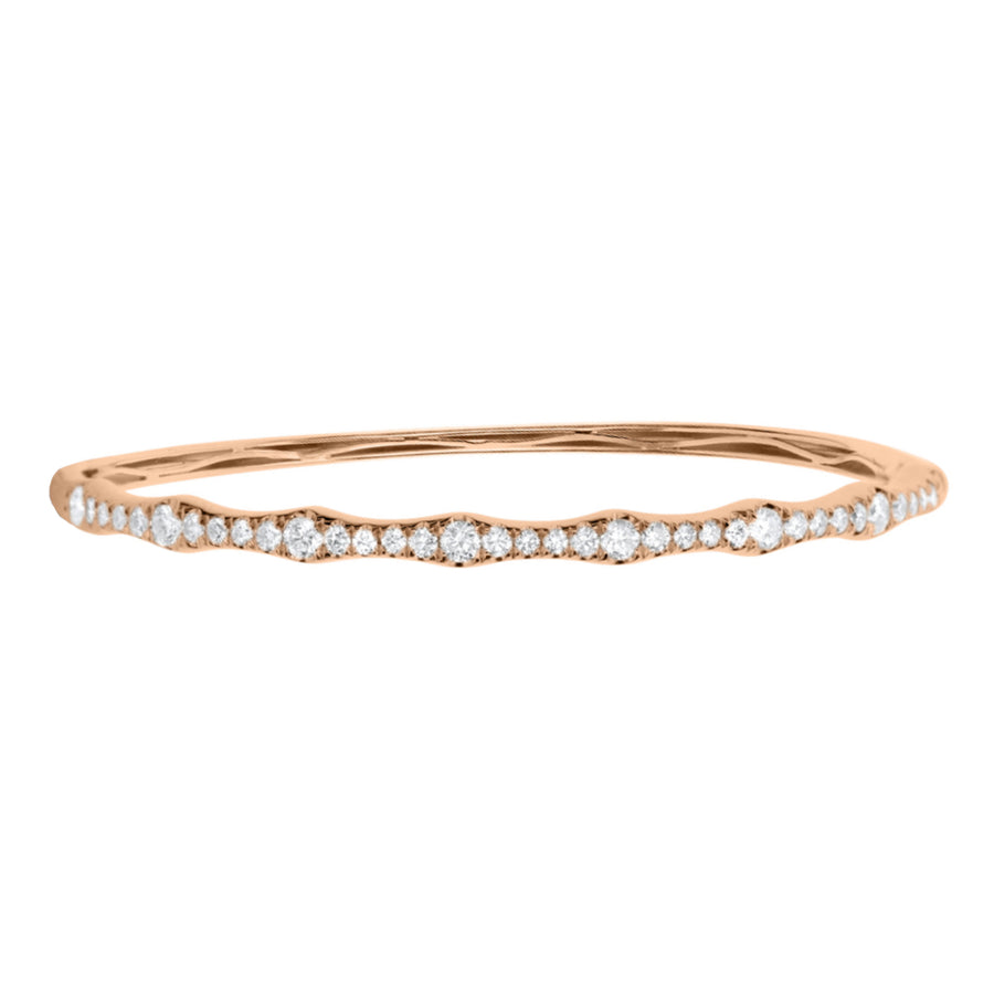 This 18K rose gold bracelet design is bound to leave everyone you encounter speechless with desire. The shape of chic. A textured finish gives diamond bangle a fresh, modern dimension.