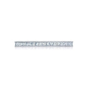 A single; pure row of bright channel set princess cut diamonds link in an eternal circle; with lace-like crescents and milgrain detail on both sides.Total Carats in wedding ring as pictured equal approximately  0.6Metal Shown: Platinum