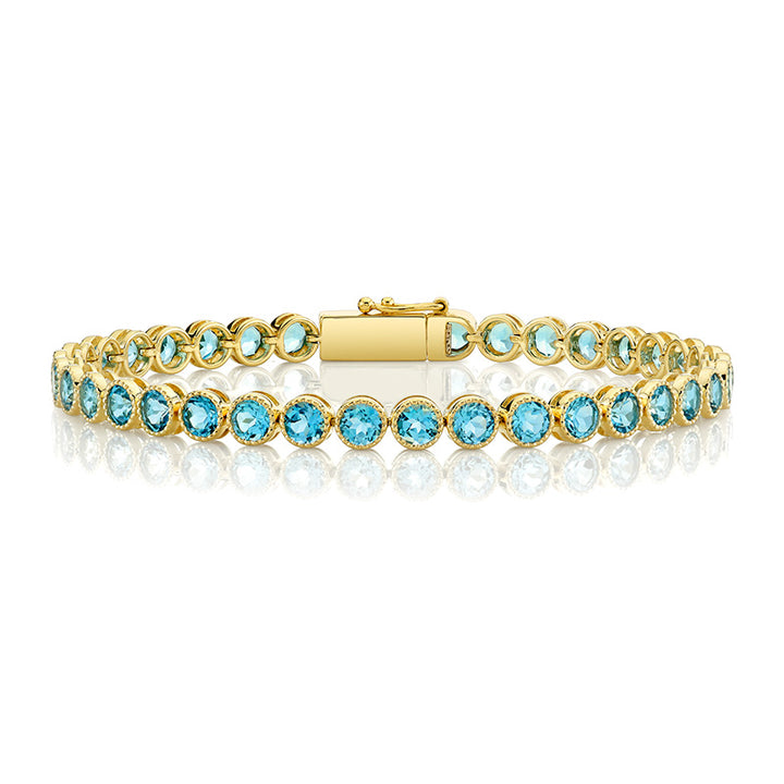 Oval Swiss Blue Topaz Tennis Bracelet with Gypsy Diamonds | Angara