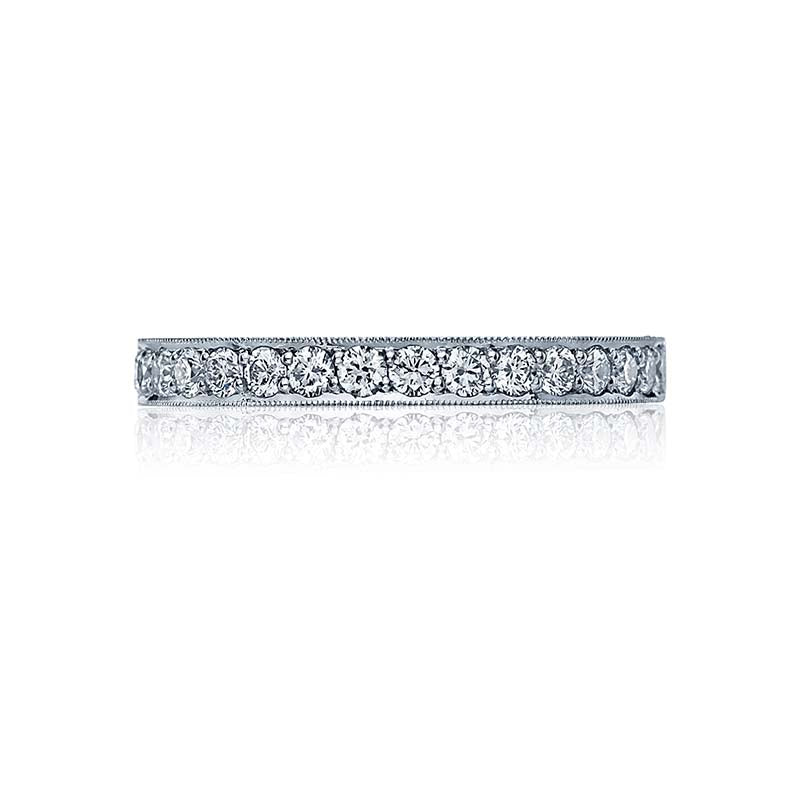 A beautiful platinum band with .45 carats of diamonds channel set halfway around the band.Total Carats in wedding ring as pictured equal approximately  0.45Metal Shown: PlatinumAvailable in Platinum; as well as 18K White; Yellow and Rose Gold