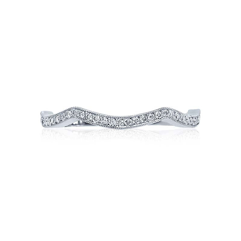 This platinum contoured band is hand-set with round pav? set diamonds.Total Carats in wedding ring as pictured equal approximately  0.15Metal Shown: PlatinumAvailable in Platinum; as well as 18K White; Yellow and Rose Gold