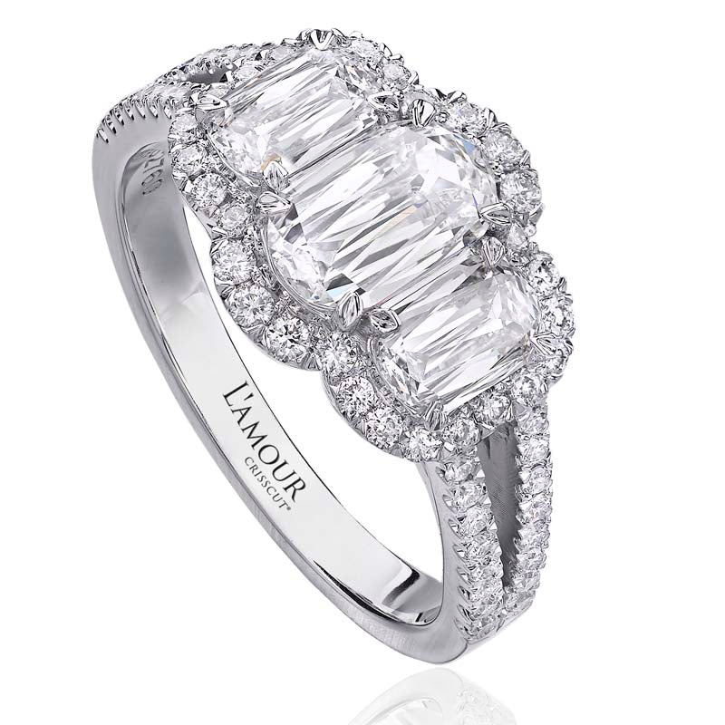 Christopher Designs engagement ring with 0.65ct L'Amour Crisscut diamond center and 2 L'Amour Crisscut side stones 0.54cttw, surrounded by round diamonds 0.28cttw. 3 stone halo engagement ring features pave set split shank with diamonds going half way around the finger set in 18K white gold.