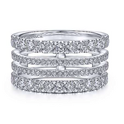 This beautiful ring creates the illusion of stackable rings but in one simple ring. The top and bottom rows have larger diamonds, and the inner two rows have smaller diamonds. Beautiful fashion ring for your right hand! 