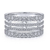 This beautiful ring creates the illusion of stackable rings but in one simple ring. The top and bottom rows have larger diamonds, and the inner two rows have smaller diamonds. Beautiful fashion ring for your right hand! 