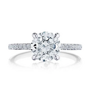 A bold solitaire diamond look with a thin band - this exceptional beauty will make you say I Do. Look for the secret detail diamond-inscribed T detail on the setting of the ring.Diamond Carat Weight (not including center diamond): 0.26ctw*Price varies depending on center stone carat weight.